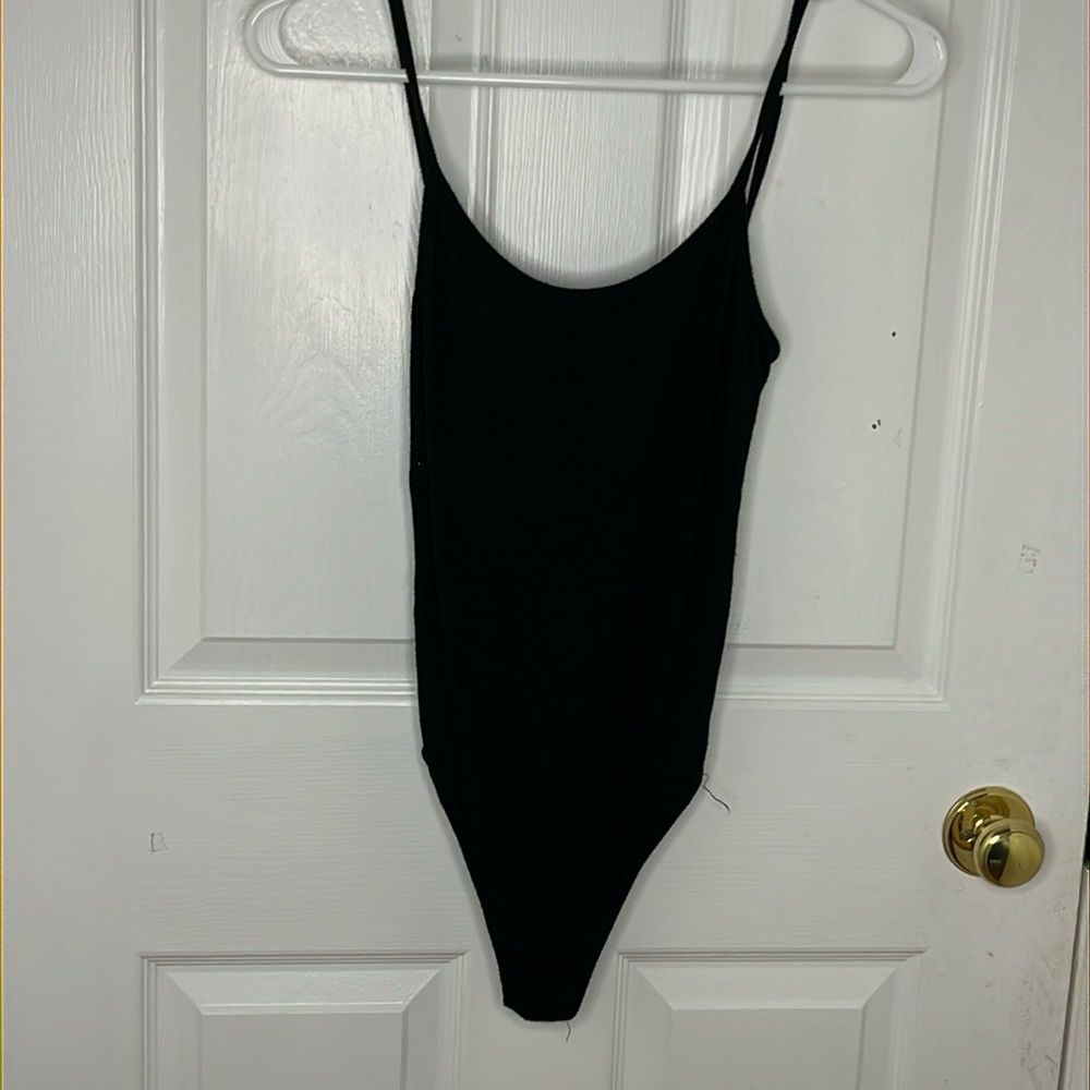 Open Back black body suit from brandy melville , one size fits all